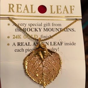 New, never unpackaged, “Real Leaf” necklace